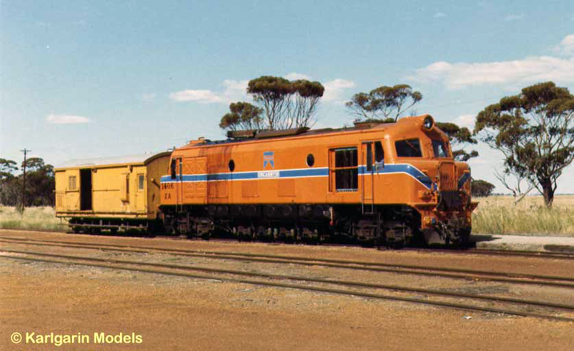 Metropolitan Vickers built the extraordinary X class diesels for the WAGR. They were designed for use on lightly laid country lines, having a very light axle load courtesy of the four driving axles between the bogies. XA1406 Ungarinyin at Narembeen, on the more easterly of the two lines running south from Merredin